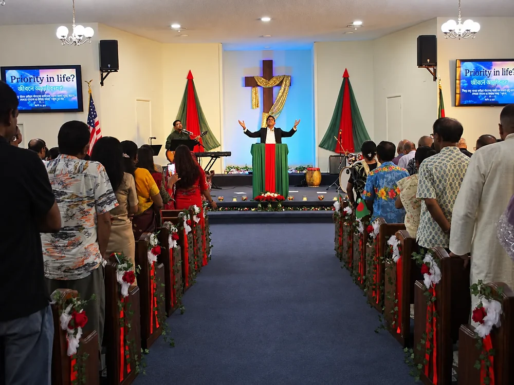 GPBC congregation worshiping together during a church service